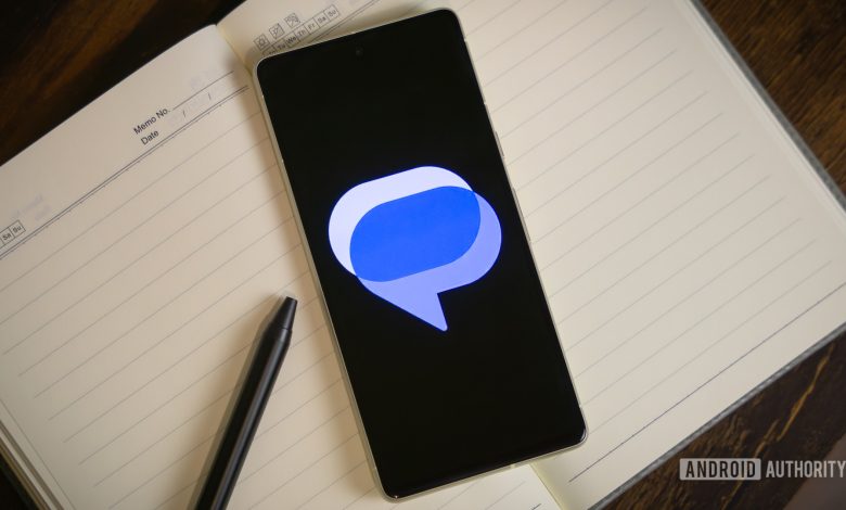 Google Messages logo on smartphone laying on table (4)