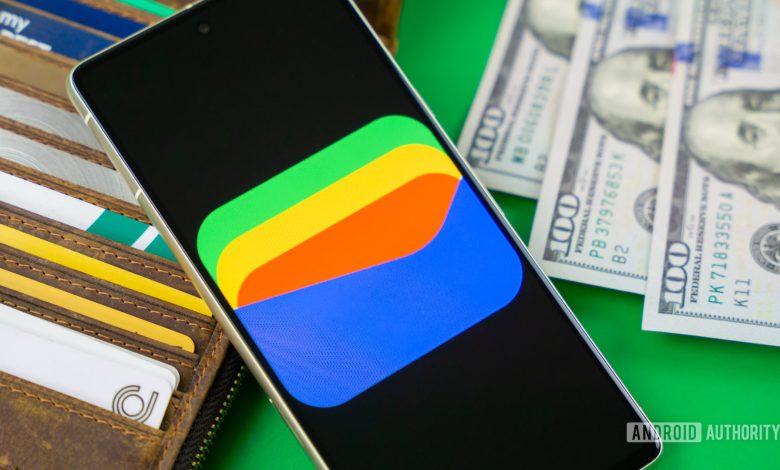 Google Wallet logo on smartphone next to credit cards and cash Stock photo 11