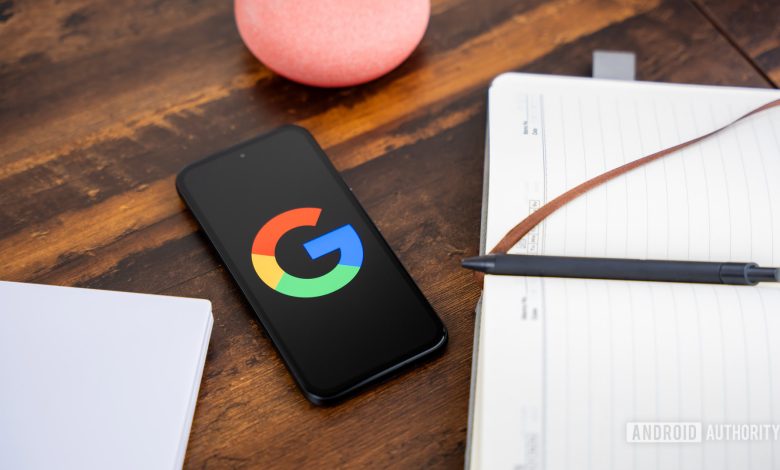 Google or Google Search logo on smartphone stock photo (6)