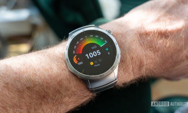 Huawei Watch GT 4 smartwatch on wrist showing calorie counter