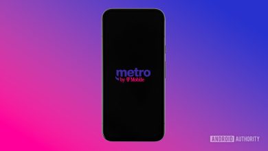 Metro by T Mobile logo on smartphone with colored background stock photo