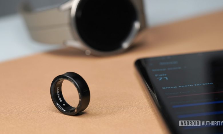 A Samsung Galaxy Ring rests alongside a Galaxy phone displaying sleep factors and a Galaxy Watch 5 Pro. factors