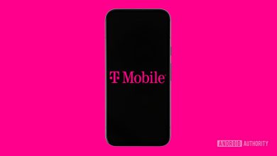 T Mobile logo on smartphone with colored background stock photo