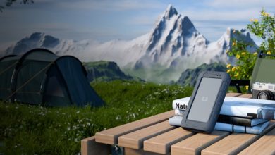 UnifyDrive UT2 on a table in front of a scenic background