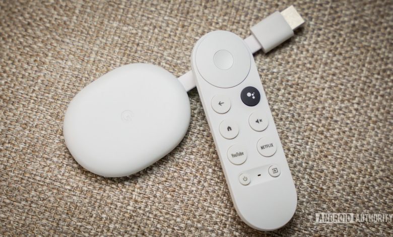 Chromecast with Google TV HD next to remote 4