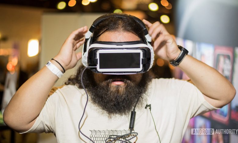 Edgar strapping on a VR headset