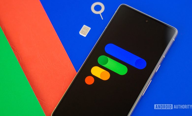 Google Fi Wireless logo on smartphone with SIM card and SIM ejector next to it Stock photo 7