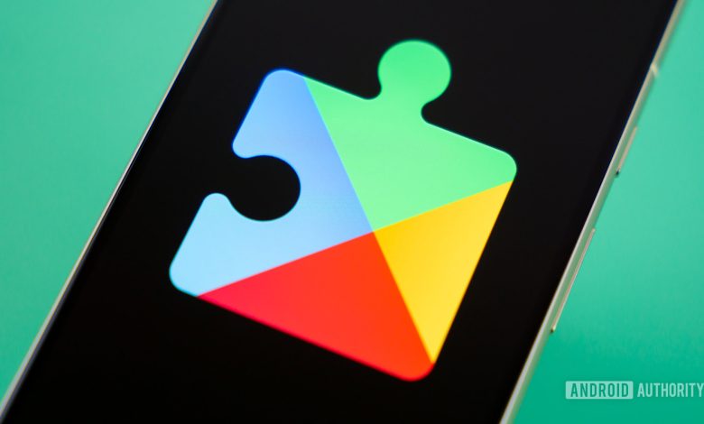 Google Play Services logo on smartphone Stock photo 1