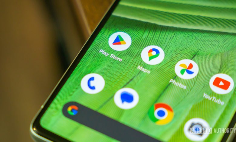 Google Play Store app next to other Google Apps stock photo