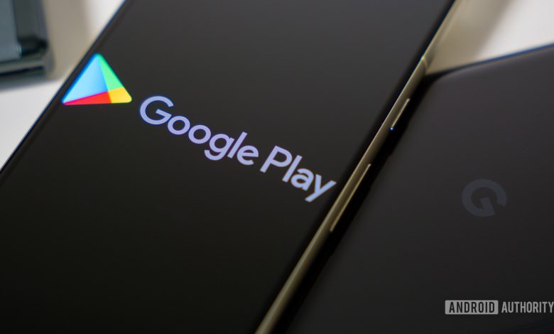 Google Play Store logo on smartphone stock photo (3)