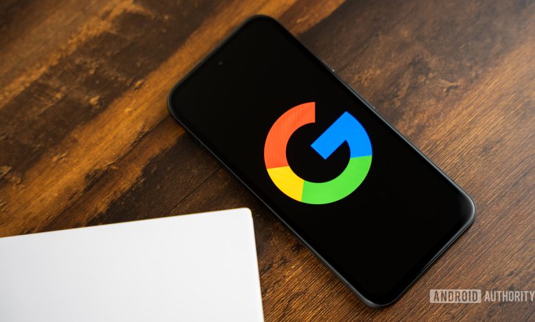 Google or Google Search logo on smartphone stock photo (2)