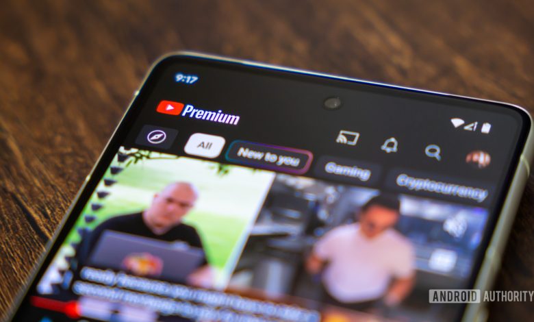 YouTube premium app on smartphone stock photo (2)