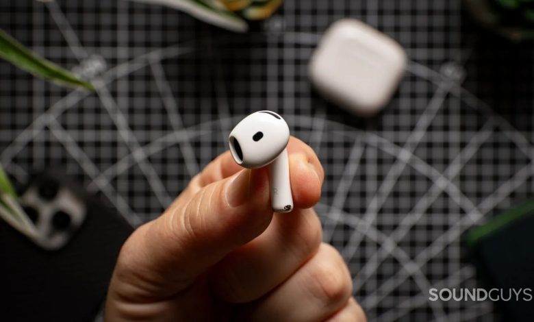 Apple AirPods 4 bud in hand