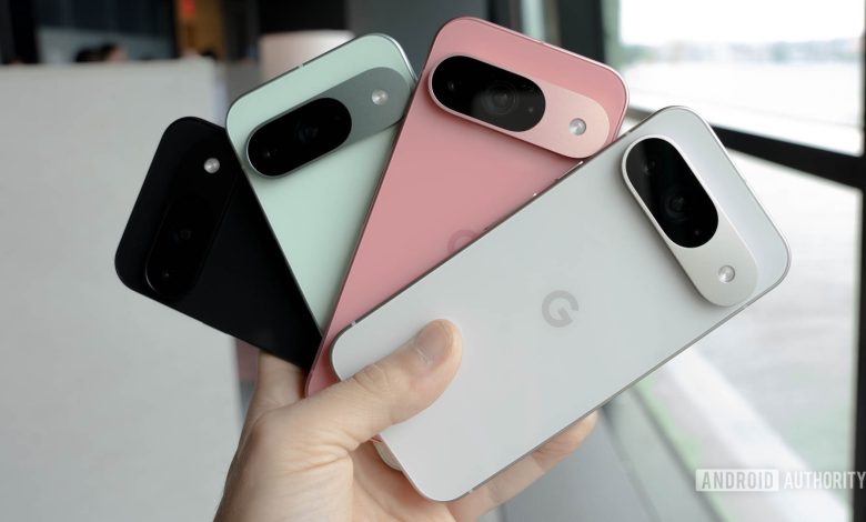 Google Pixel 9 in four colors all held in one person's hand in a fan shape