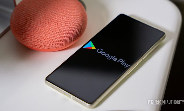 Google Play Store logo on smartphone stock photo (6)