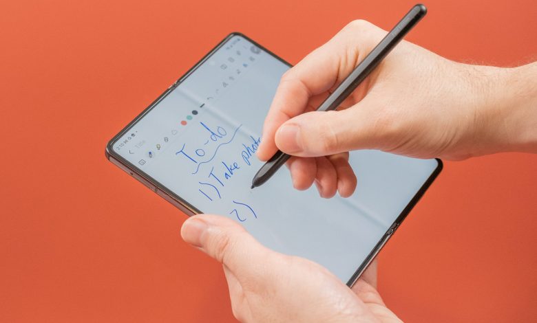 Holding the Galaxy Z Fold 4 and taking notes with the S Pen