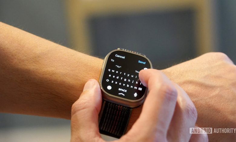 A user types on the keyboard of their Apple Watch Ultra.