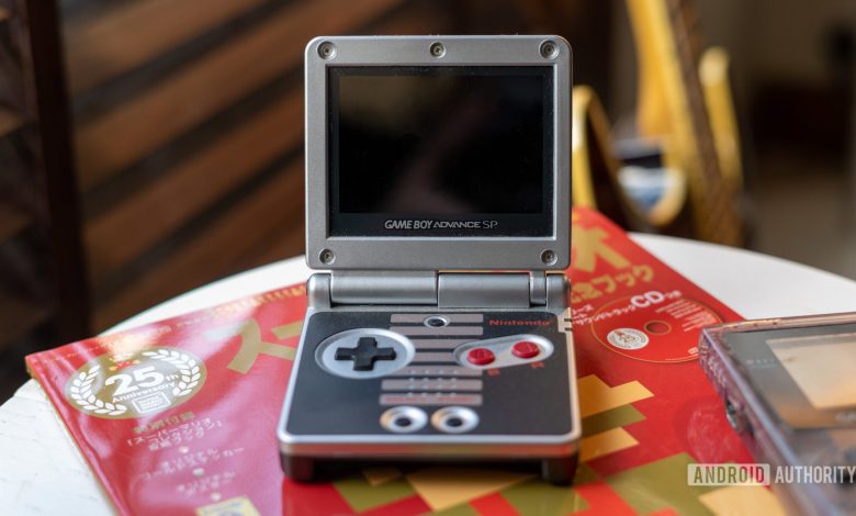 GameBoy Advance SP placed on a magazine