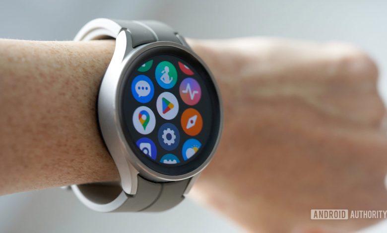 A Samsung Galaxy Watch 5 Pro on a user's wrist displays the app screen.