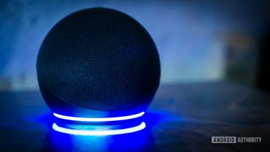 Amazon Echo Dot Alexa speaker with light ring turned on stock photo 1