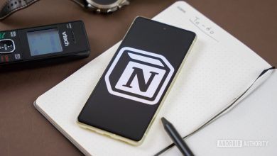 Notion logo on snartphone next to other office products Stock photo 2