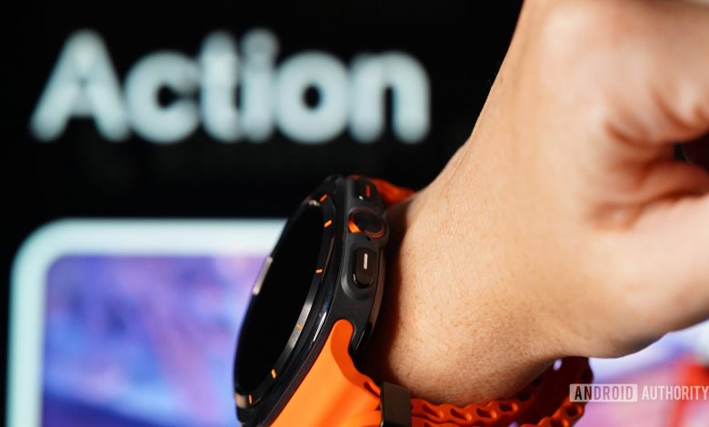 A Samsung Galaxy Watch Ultra user models the device's Action button.