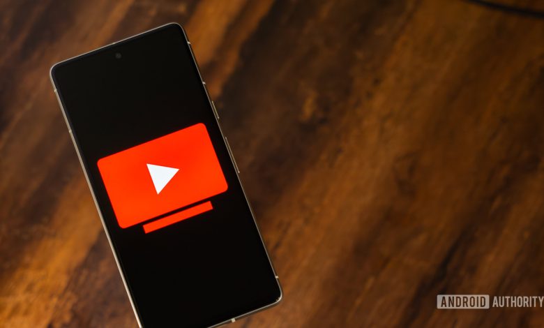 YouTube TV logo on smartphone stock photo (4)